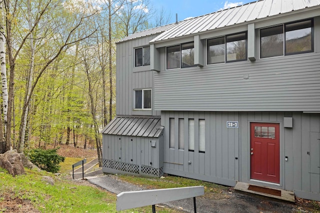 28 Fox Run Rd Unit 1And 2, Lincoln, NH 03251 - back of house with metal roof and board and batten siding