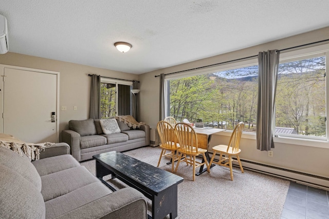 28 Fox Run Rd Unit 1And 2, Lincoln, NH 03251 - living area with a textured ceiling, light tile patterned floors, and a baseboard heating unit