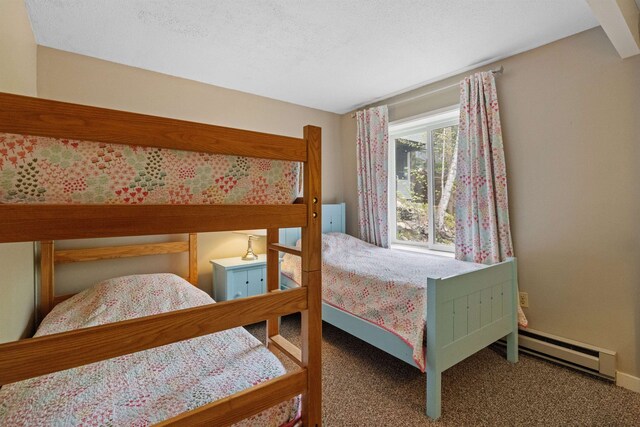 28 Fox Run Rd Unit 1And 2, Lincoln, NH 03251 - carpeted bedroom featuring a baseboard heating unit