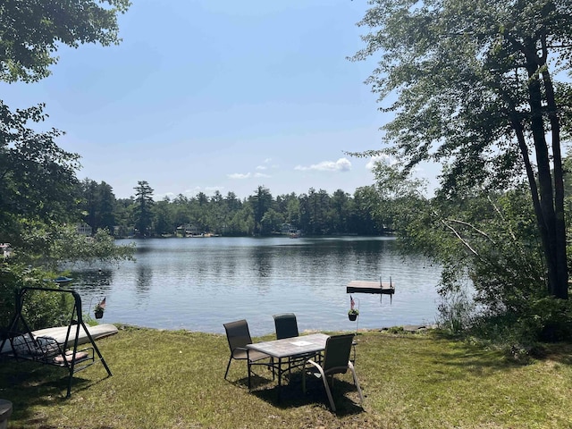 water view featuring a heavily wooded area