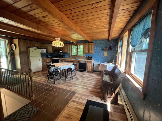 living room featuring plenty of natural light, beamed ceiling, dark wood-style floors, wooden ceiling, and a baseboard heating unit