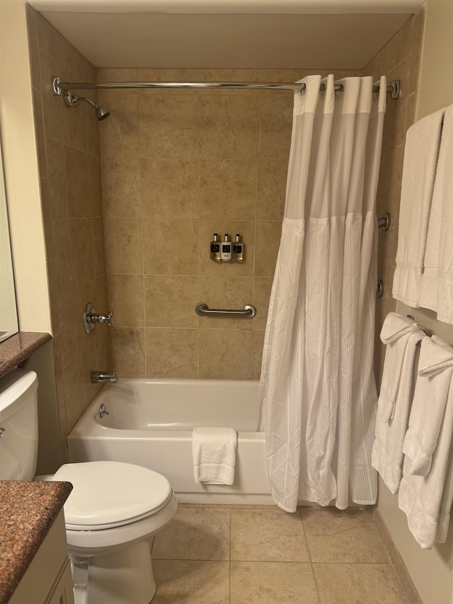 full bath with shower / tub combo with curtain, toilet, tile patterned floors, and vanity