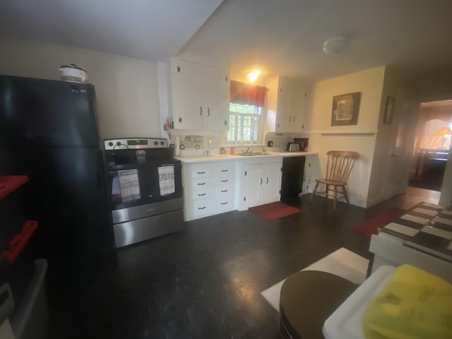 108B Main St Unit B, Plaistow, NH 03865 - kitchen featuring electric stove, a sink, white cabinetry, freestanding refrigerator, and light countertops