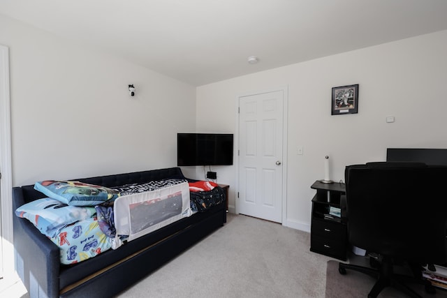 81 Spaulding Rd, Fremont, NH 03044 - carpeted bedroom with a desk and baseboards