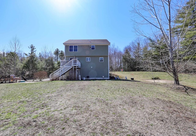 81 Spaulding Rd, Fremont, NH 03044 - back of property featuring stairway and a yard
