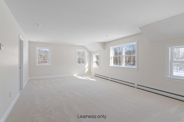 74 Willow Way, Georgia, VT 05468 - empty room featuring a baseboard radiator and light colored carpet