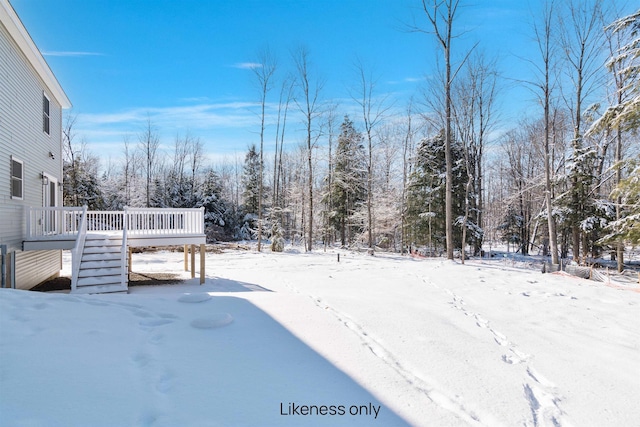 74 Willow Way, Georgia, VT 05468 - snowy yard with a wooden deck and stairs
