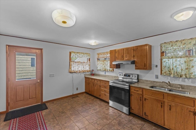 173 Tracy Dr, Burlington, VT 05408 - kitchen featuring stainless steel electric range, a sink, under cabinet range hood, light countertops, and brown cabinets