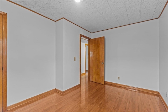 173 Tracy Dr, Burlington, VT 05408 - unfurnished room with ornamental molding, light wood finished floors, and baseboards