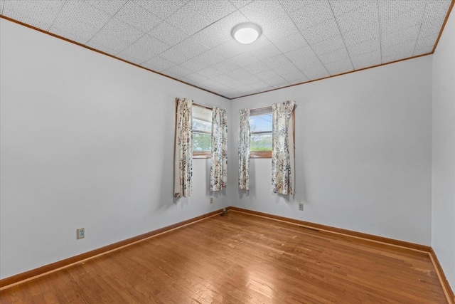 173 Tracy Dr, Burlington, VT 05408 - unfurnished room featuring crown molding, wood finished floors, and baseboards