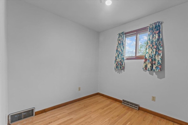 173 Tracy Dr, Burlington, VT 05408 - spare room featuring baseboards and light wood-type flooring