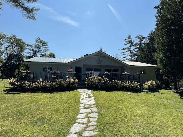 406 Partridge Lake Rd, Littleton, NH 03561 - view of front of home featuring a front yard and a wooden deck