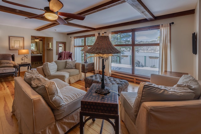 406 Partridge Lake Rd, Littleton, NH 03561 - living room featuring a ceiling fan, beamed ceiling, and light wood finished floors