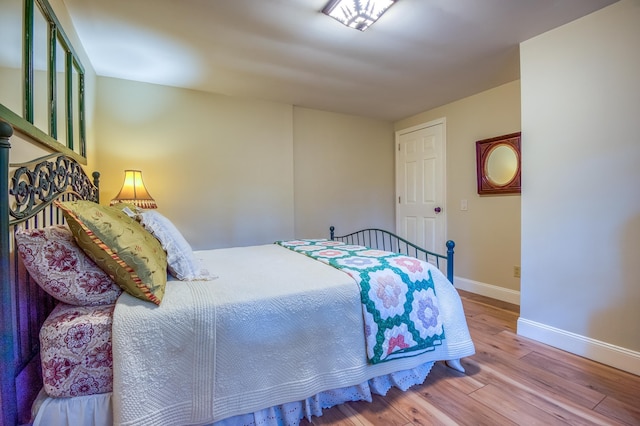 406 Partridge Lake Rd, Littleton, NH 03561 - bedroom featuring baseboards and wood finished floors