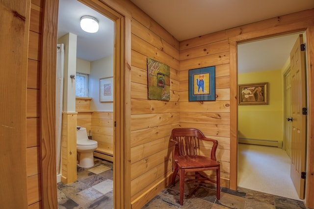 406 Partridge Lake Rd, Littleton, NH 03561 - hall with a baseboard heating unit and stone finish floors