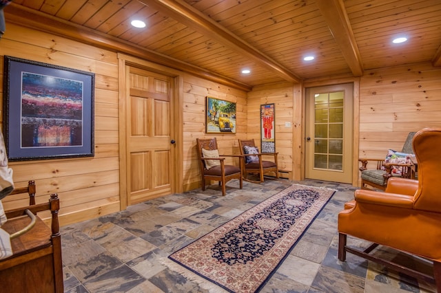406 Partridge Lake Rd, Littleton, NH 03561 - sitting room with wooden ceiling, beam ceiling, wood walls, stone finish flooring, and recessed lighting