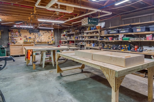 406 Partridge Lake Rd, Littleton, NH 03561 - unfinished basement with a workshop area