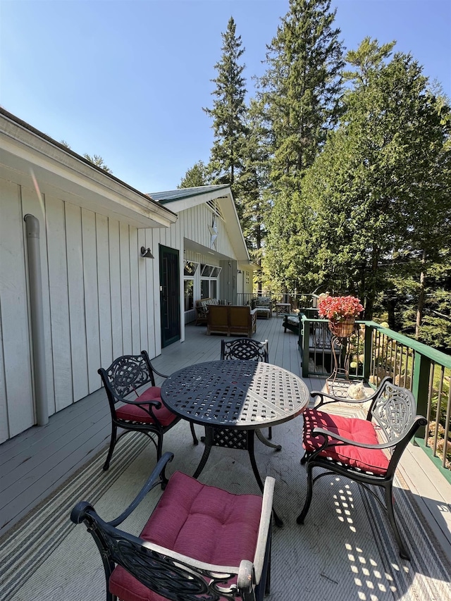 406 Partridge Lake Rd, Littleton, NH 03561 - deck featuring outdoor dining area and an outdoor living space