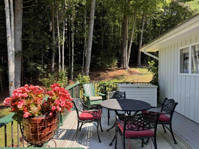 406 Partridge Lake Rd, Littleton, NH 03561 - wooden deck with outdoor dining space