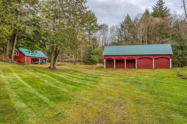 406 Partridge Lake Rd, Littleton, NH 03561 - view of green lawn with an outbuilding