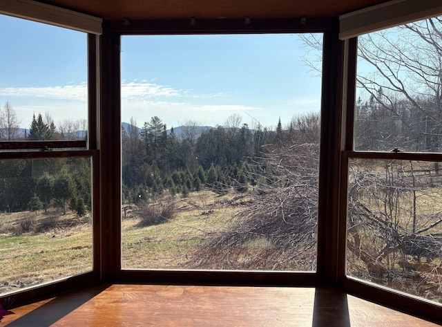 1202 Cotton Rd, Lyndon, VT 05851 - unfurnished sunroom with wood finished floors