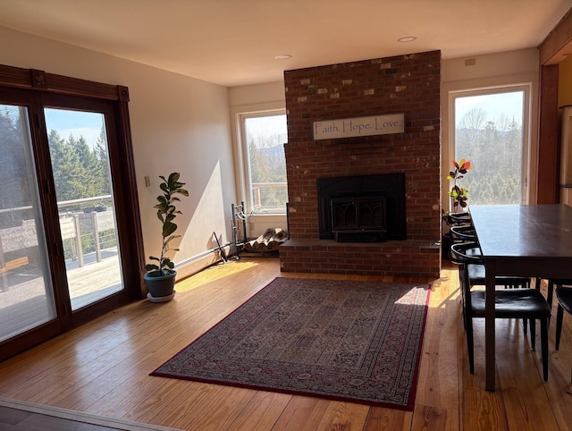1202 Cotton Rd, Lyndon, VT 05851 - living room featuring hardwood / wood-style floors and a fireplace