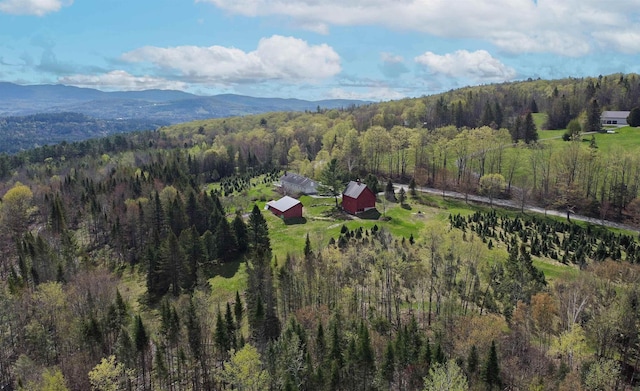 1202 Cotton Rd, Lyndon, VT 05851 - aerial view of property and surrounding area featuring a forest and a mountainous background