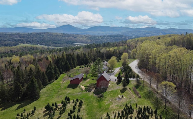 1202 Cotton Rd, Lyndon, VT 05851 - aerial view of property and surrounding area featuring a forest and mountains