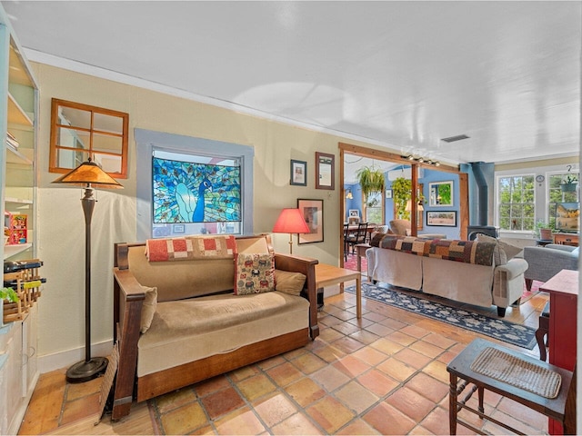 living room with ornamental molding