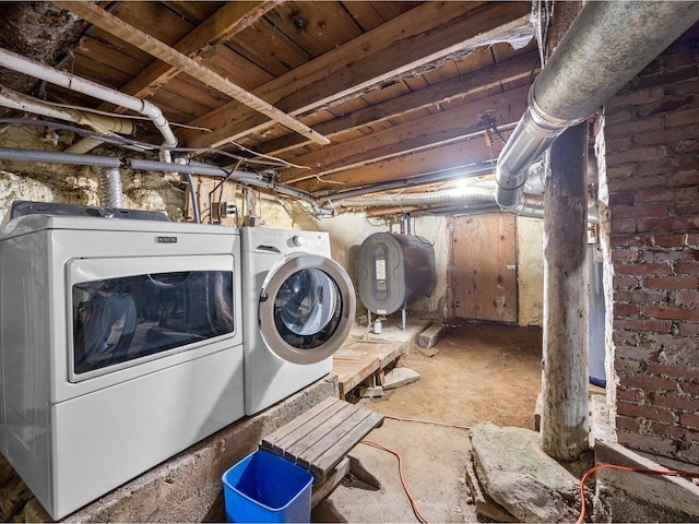 washroom with oil tank and separate washer and dryer