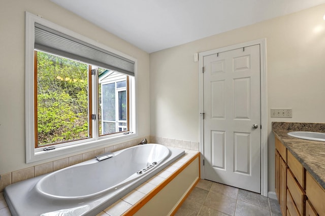 17 Ches Mae Ln, Milford, NH 03055 - bathroom with a garden tub, vanity, and tile patterned floors