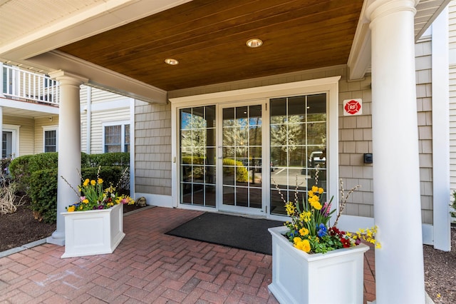 entrance to property featuring covered porch