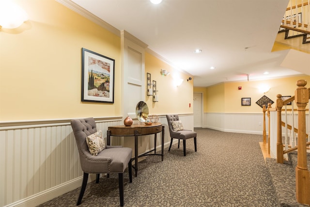 living area with ornamental molding, wainscoting, carpet, stairs, and recessed lighting