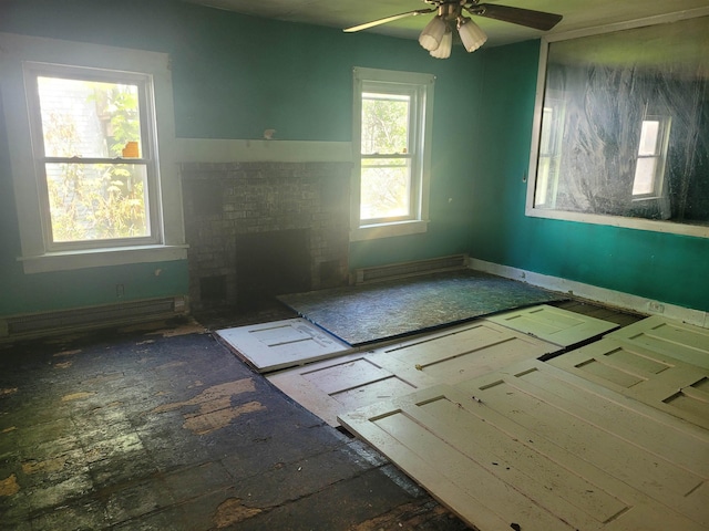70 Bridge St, Hillsborough, NH 03244 - spare room featuring baseboard heating, ceiling fan, and baseboards
