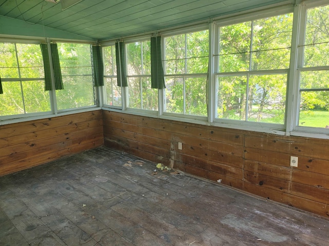 70 Bridge St, Hillsborough, NH 03244 - unfurnished sunroom with hardwood / wood-style flooring, lofted ceiling, wood walls, and wood ceiling