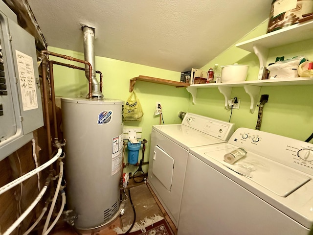 23 Mason Hill Rd, Tamworth, NH 03886 - laundry area featuring washing machine and clothes dryer, gas water heater, a textured ceiling, and electric panel