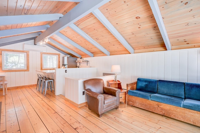 living area featuring light wood-type flooring, wood ceiling, a wall unit AC, and wood walls