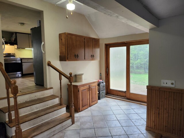 97 Ayers Rd, Canterbury, NH 03224 - kitchen with stainless steel range with electric stovetop, a ceiling fan, freestanding refrigerator, lofted ceiling, and light countertops