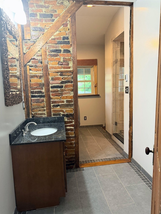 2678 Silver St, Hinesburg, VT 05461 - bathroom with vanity, tile patterned flooring, and baseboards
