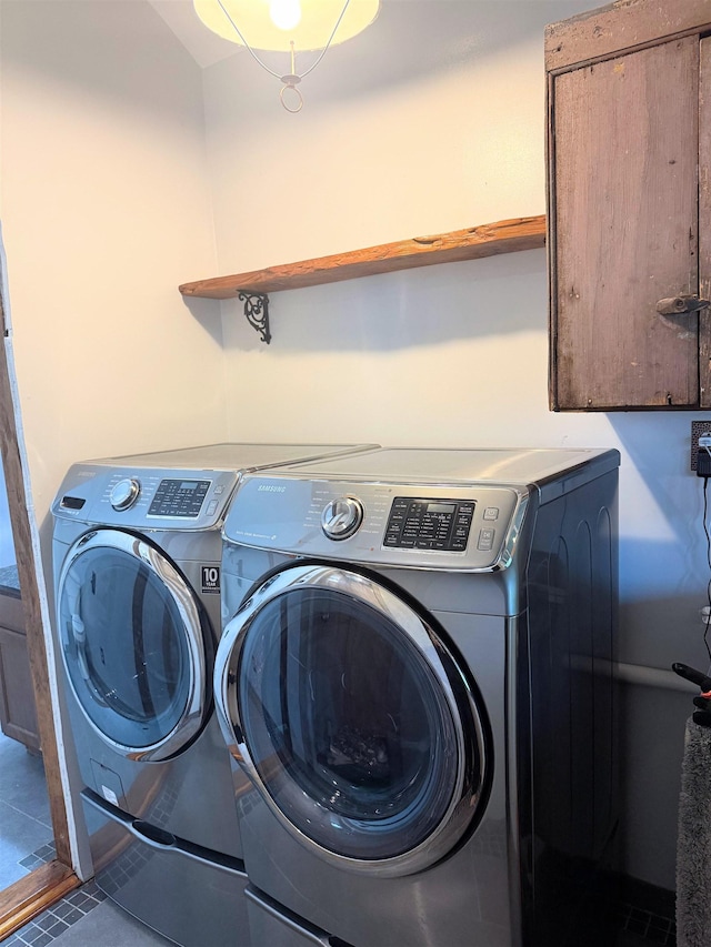 2678 Silver St, Hinesburg, VT 05461 - washroom featuring washing machine and dryer and tile patterned floors