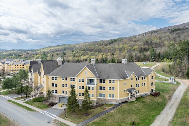 view from above of property featuring a forest