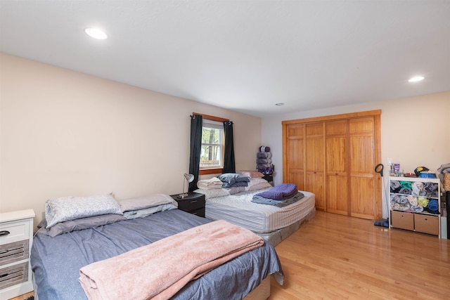 40 Butternut Ln, Conway, NH 03813 - bedroom with light wood finished floors, a closet, and recessed lighting