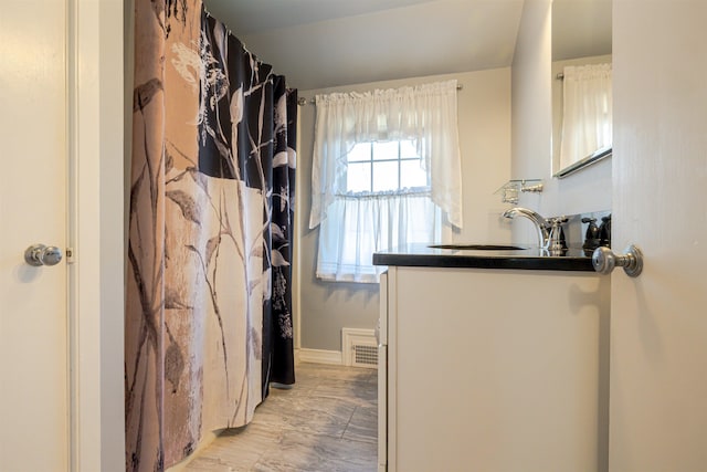 laundry area featuring a sink