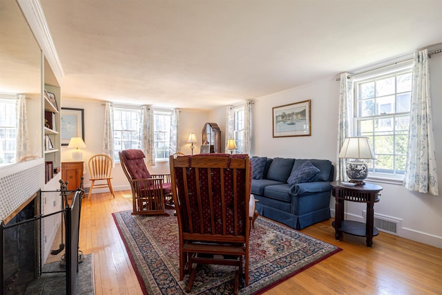 living room with wood finished floors and baseboards