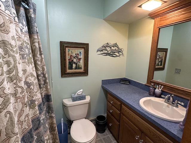 887 Harold Dow Hwy, Eliot, ME 03909 - bathroom with toilet, vanity, and tile patterned floors