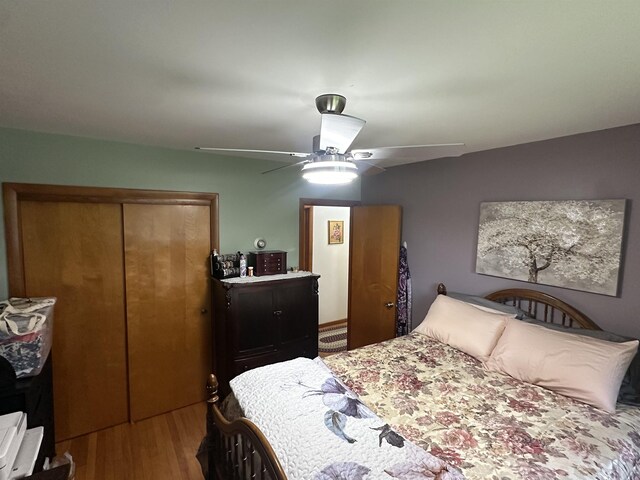 887 Harold Dow Hwy, Eliot, ME 03909 - bedroom with a closet, wood finished floors, and a ceiling fan