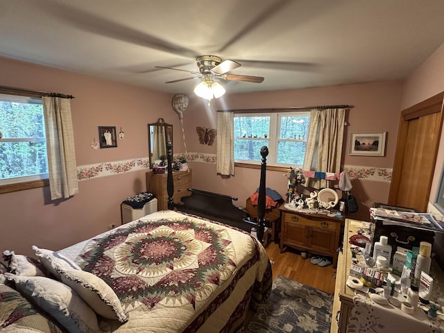 887 Harold Dow Hwy, Eliot, ME 03909 - bedroom with light wood finished floors and ceiling fan