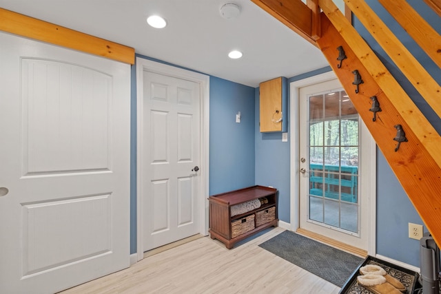 34 Bay Rd, Conway, NH 03818 - doorway with light wood-type flooring, baseboards, and recessed lighting
