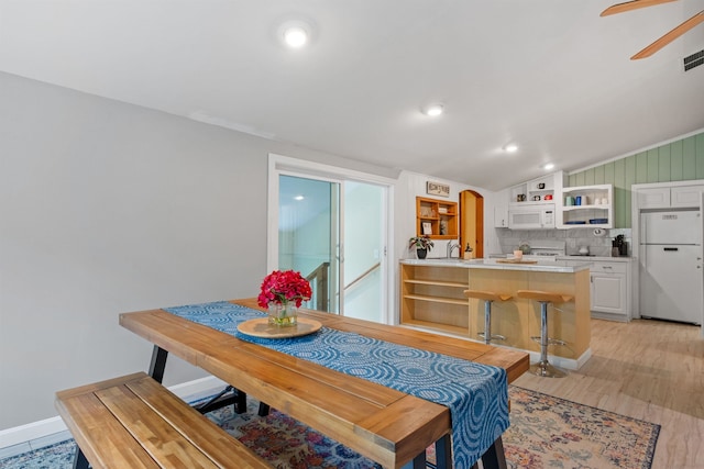 34 Bay Rd, Conway, NH 03818 - dining room with vaulted ceiling, light wood-type flooring, arched walkways, a ceiling fan, and recessed lighting