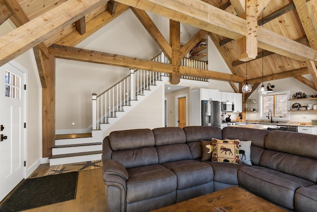 LOT22 Compass Point Rd, Thornton, NH 03285 - living area featuring stairway, dark wood-type flooring, high vaulted ceiling, and a wood ceiling with exposed beams